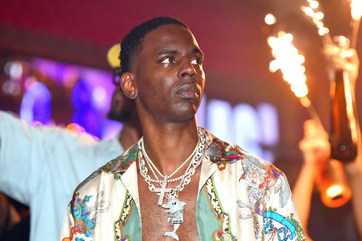 Young dolph wearing miami dolphins jersey on Craiyon
